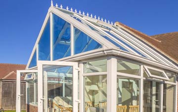 conservatory roof insulation costs Llanwyddelan